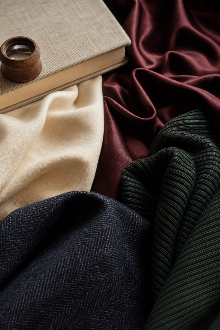 Close view of plain weave, satin, rib knit and wool twill fabrics
